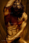 Golden nude male figure in shadowed lighting with sculptural physique, hand over head and torso, evoking sacred masculinity, reverence, and classical grace.
