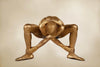 Golden nude squat yoga pose fine art photography – luxury wall art for wellness, meditation rooms, and contemporary interiors