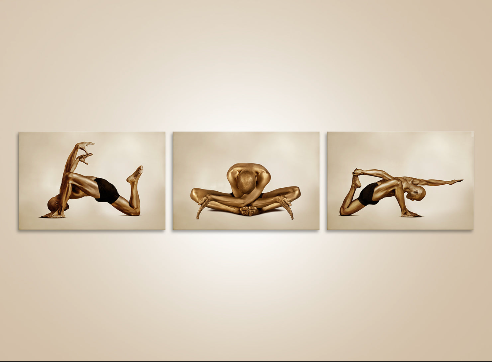 Golden nude yoga triptych wall art – luxury fine art photography for wellness and meditation spaces