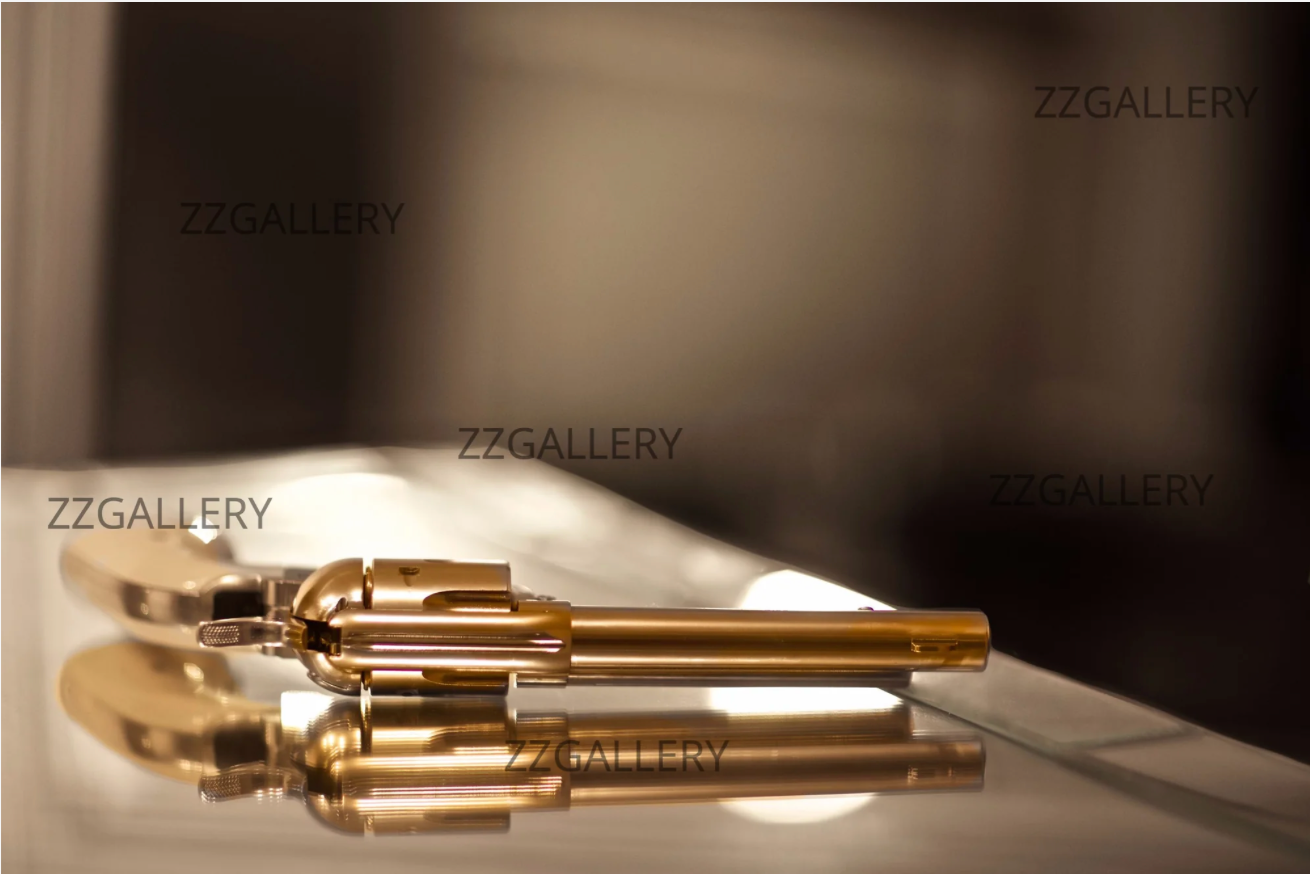 Golden revolver luxury contemporary fine art object photography by Zack Zublena – sleek gold object artwork for collectors, modern interiors, and hotels.