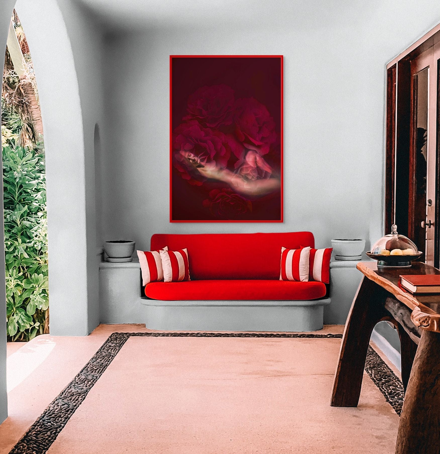 Elegant red interior with luxury wall decor featuring surreal golden artwork of roses, creating a bold and modern fine art atmosphere