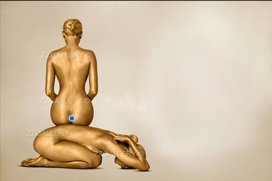 Golden-painted figures in a sculptural yoga pose, captured in a fine art photograph symbolizing harmony, balance, and strength. Perfect for luxury interiors, modern art collectors, wellness spaces, and meditation rooms.