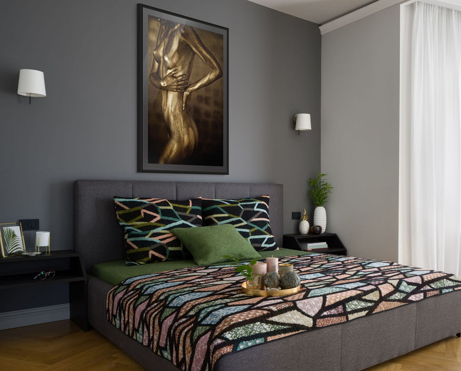 Golden silhouette body art photography above a modern bedroom bed, featuring a metallic painted figure in a sculptural pose — luxury fine art wall decor for contemporary interiors