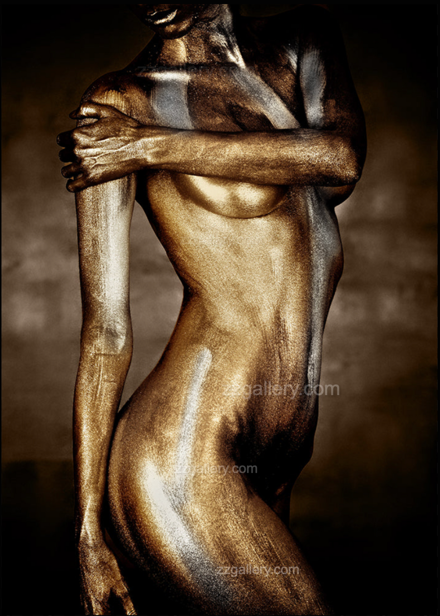 Golden metallic fine art photography featuring a figurative form painted in gold and silver tones, presented as sculptural artwork in a modern luxury interior.