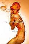 Gold female nude with orange smoke lines on white background — minimalist figurative wall art by Zack Zublena