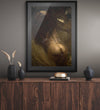 Golden Souls fine art wall print featuring a luminous figure immersed in golden water, displayed in a modern interior setting
