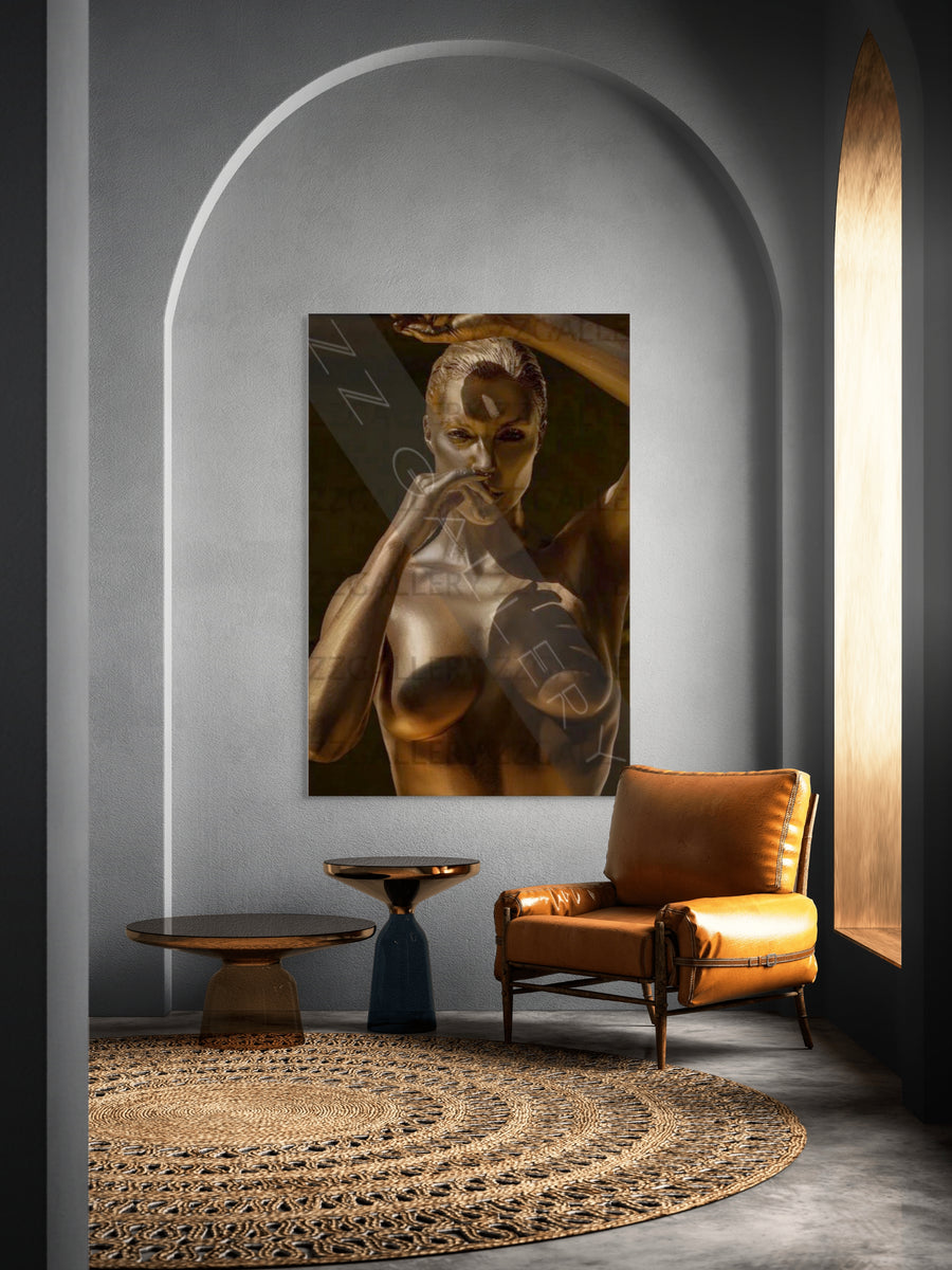 Golden figure fine art portrait by Zack Zublena displayed in a luxury modern interior, gold-painted body photography wall art, contemporary artistic wall decor.