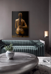 Elegant gray lounge interior with golden nude female warrior artwork holding sword, fine art wall decor for modern luxury spaces and collectors.
