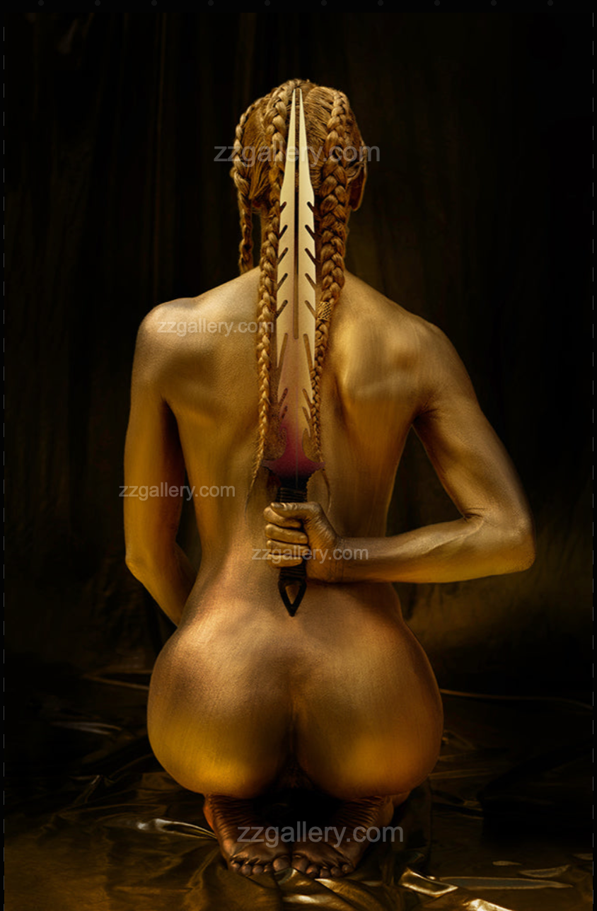 Golden-painted warrior woman kneeling with ceremonial sword, fine art photography symbolizing strength and resilience, luxury wall art.