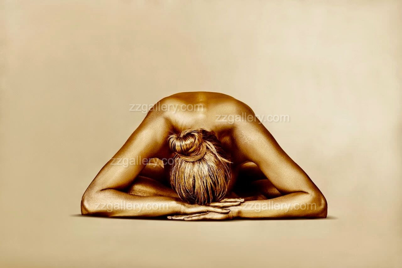Golden yoga wall art showing a figure in forward bend resting pose – serene yoga-inspired wall decor.