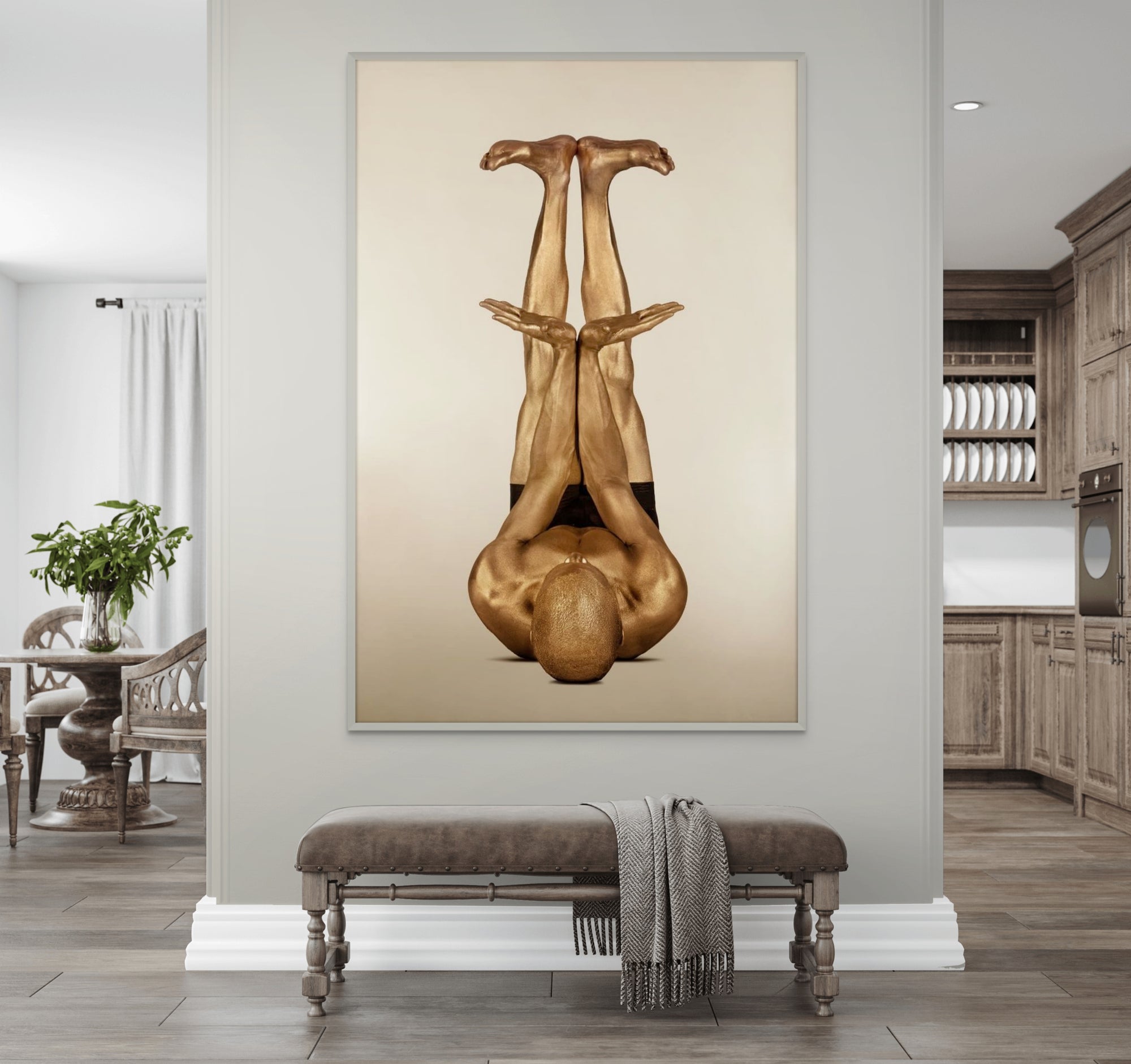 Golden-painted figure in inverted yoga pose with arms extended upward, fine art wall photography by Zack Zublena for yoga, wellness, and modern interiors.