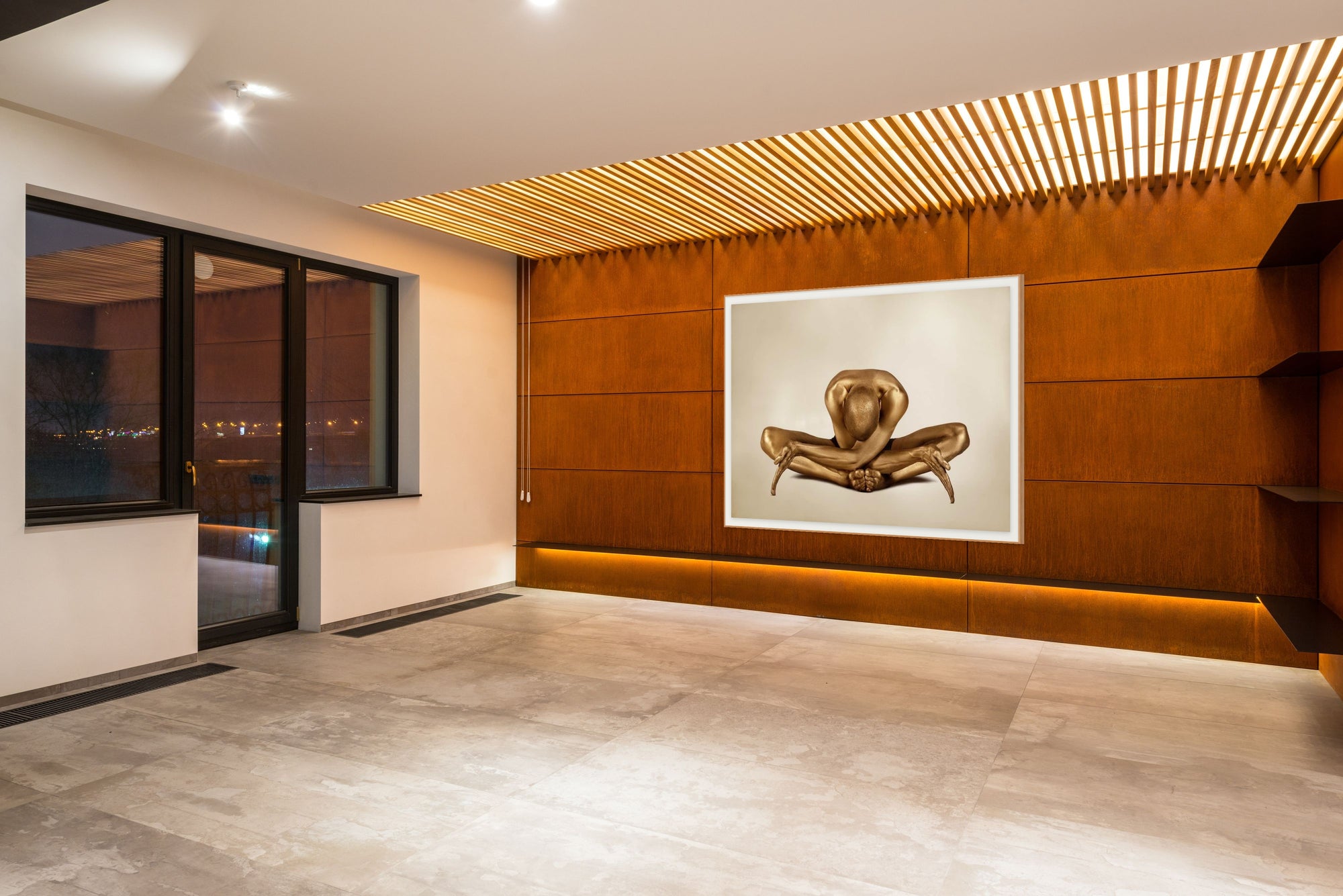 Golden-painted yogi in a deep forward fold pose, captured as an avant-garde conceptual artwork. Contemporary fine art photography by Zack Zublena.