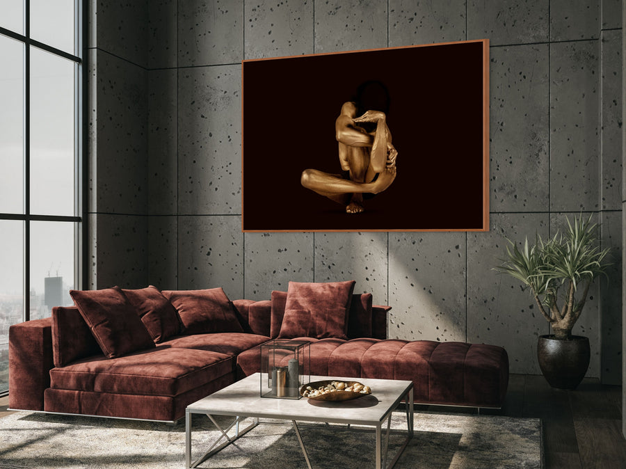 Golden-painted figure in a folded yogic pose against a deep dark background. Conceptual fine art photograph from Zack Zublena’s Vacuum State series, symbolizing ego dissolution and the void.