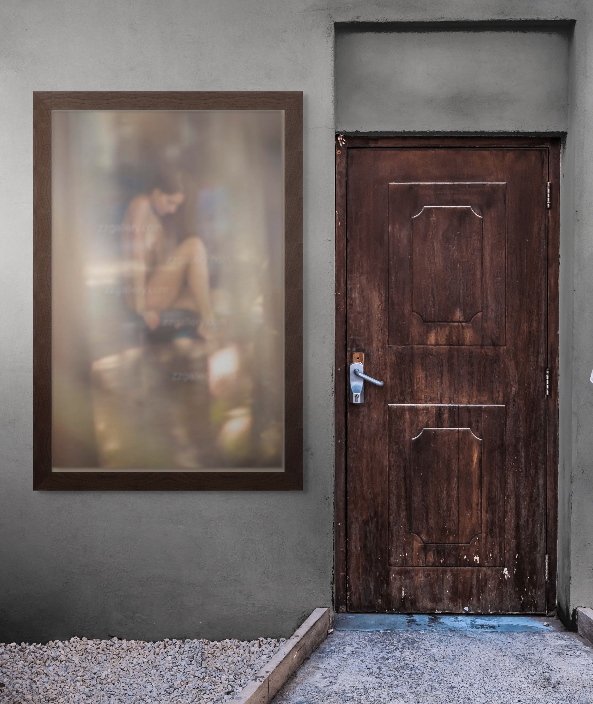 Framed golden reflection fine art photograph displayed on an outdoor wall beside a rustic wooden door, blending nature, light, and contemporary backyard design.