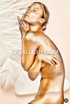 Luxury gold female nude fine art photography with white feather background