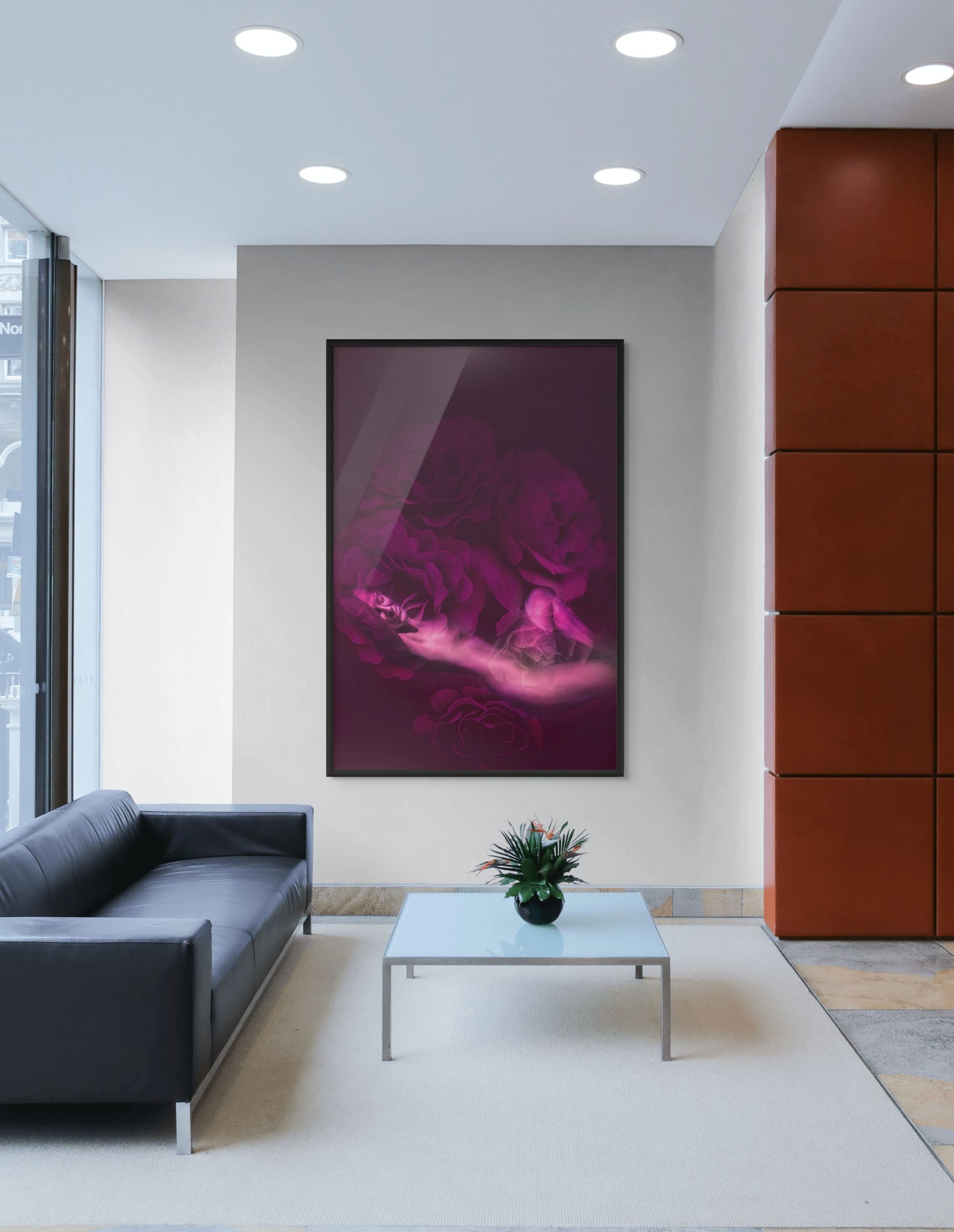 Modern interior with luxury wall decor featuring surreal magenta rose artwork in golden tones, creating an elegant fine art atmosphere.