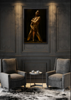 Sacred golden-painted female nude holding a sword in kneeling pose, fine art photography for luxury interiors and spiritual collectors.