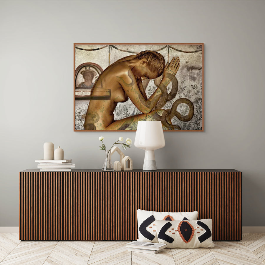 Golden-painted silhouette intertwined with a serpent, evoking sacred feminine power and Renaissance-inspired symbolism. Fine art wall decor by Zack Zublena, blending mythology, spirituality, and contemporary luxury.