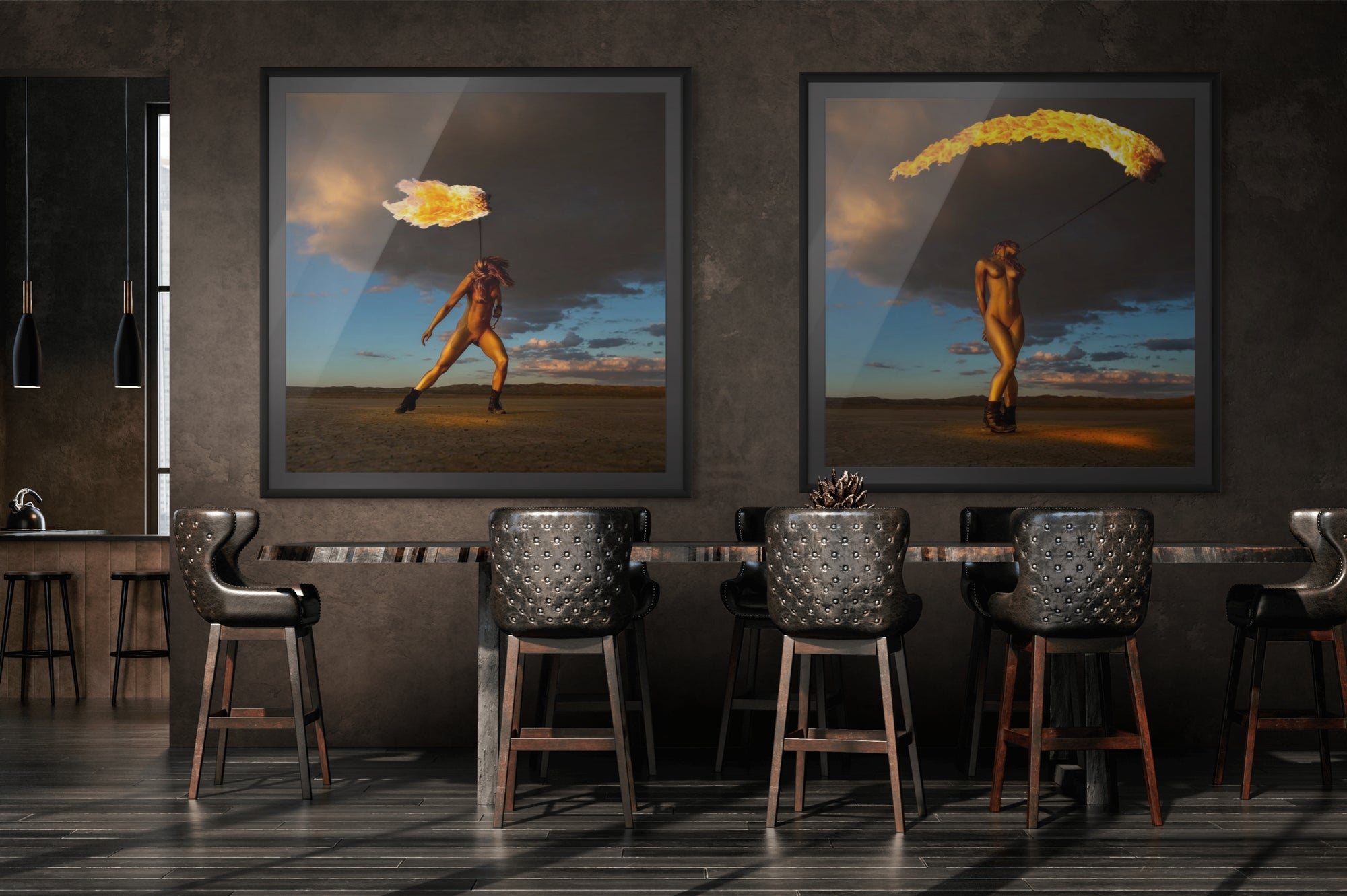 Interior view of a modern dining space featuring a diptych of fine art photography prints from the Skyfall Flames series, showing a golden-painted figure dancing with fire against a dramatic desert sky.