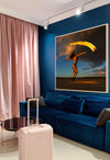 Golden-painted figure extending with sweeping flame across desert horizon – fine art photography print by Zack Zublena, Skyfall Flames Collection
