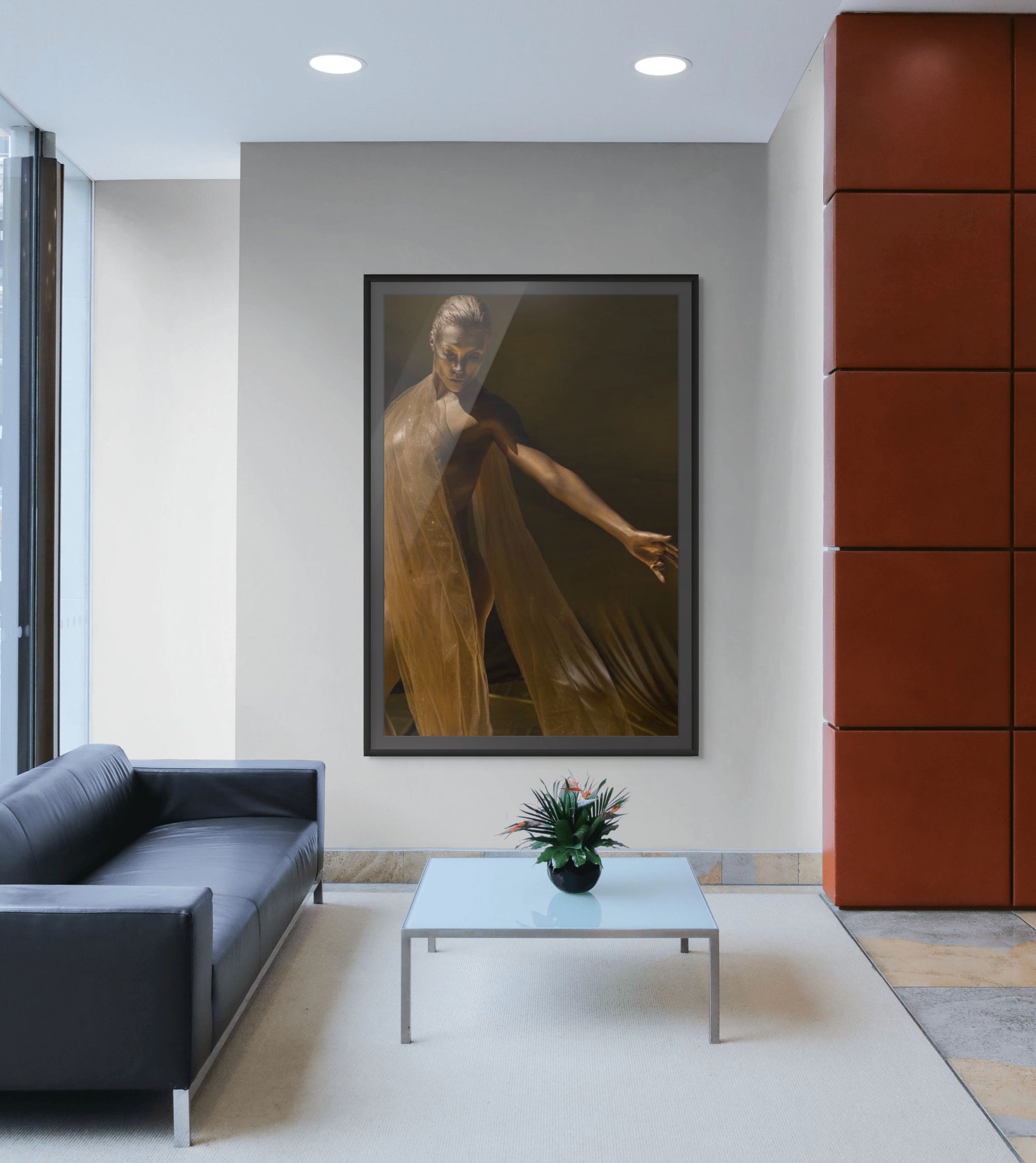 Golden fine art portrait titled The Bull Fighter, featuring a woman with metallic body paint draped in sheer fabric, posed gracefully with an outstretched arm.