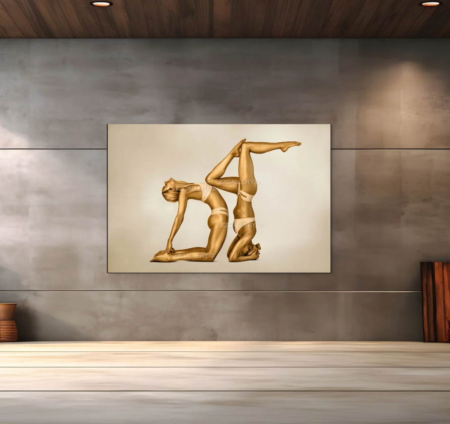 Golden duo in sculptural yoga bow pose, fine art photography symbolizing balance, harmony, and elegance. Luxury gold wall art for spas, hotels, and modern interiors.