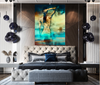 Golden silhouette artwork of a standing figure with arm raised, set against a dreamy horizon of sea and sky. Displayed in a modern luxury bedroom interior, this fine art wall décor conveys elegance, balance, and tranquility.