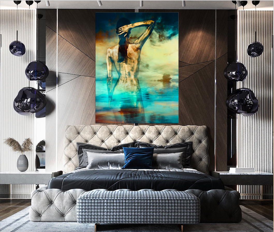 Golden silhouette artwork of a standing figure with arm raised, set against a dreamy horizon of sea and sky. Displayed in a modern luxury bedroom interior, this fine art wall décor conveys elegance, balance, and tranquility.